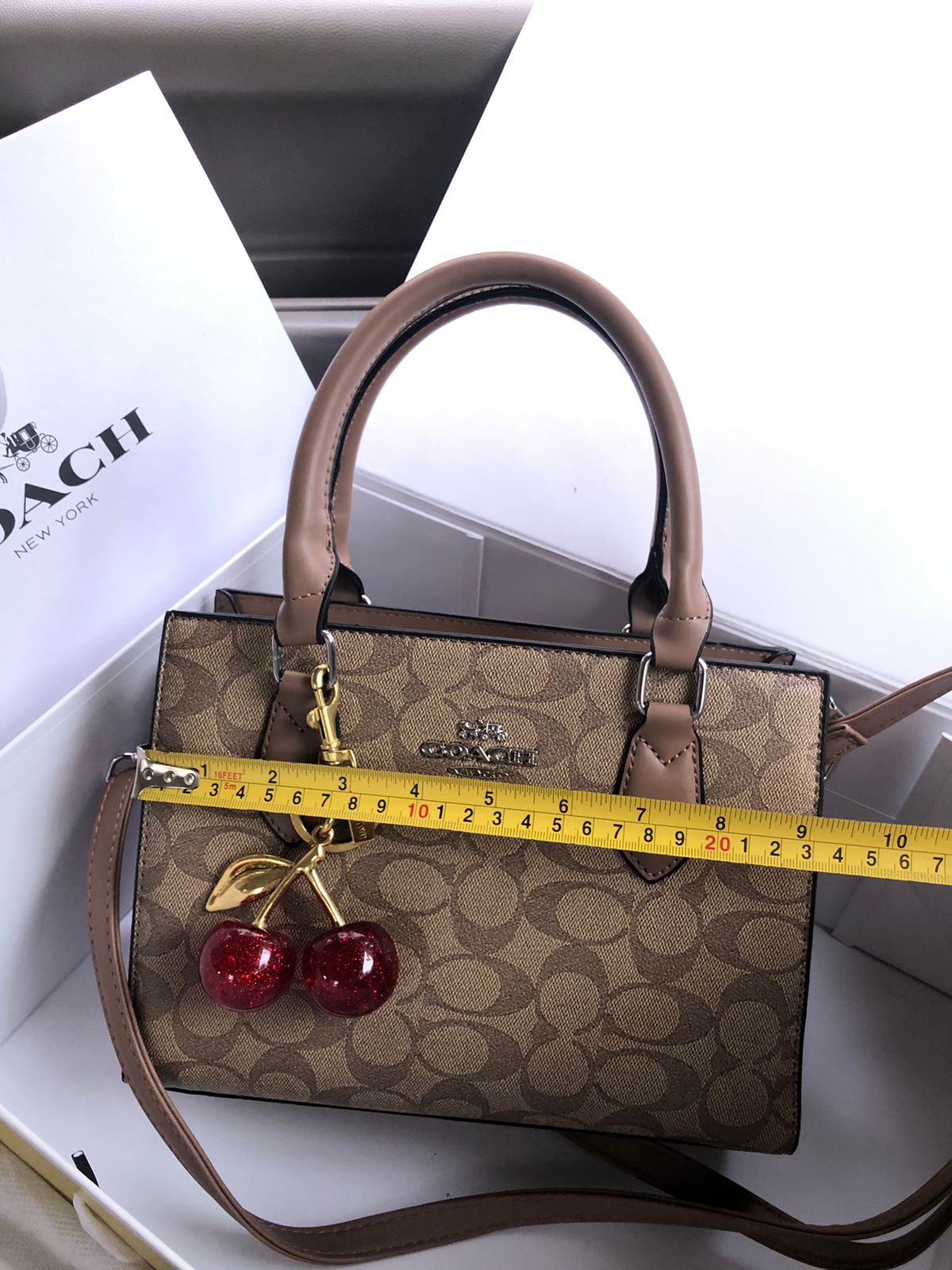 Coach Satchel Handbag with Cherry Keychain