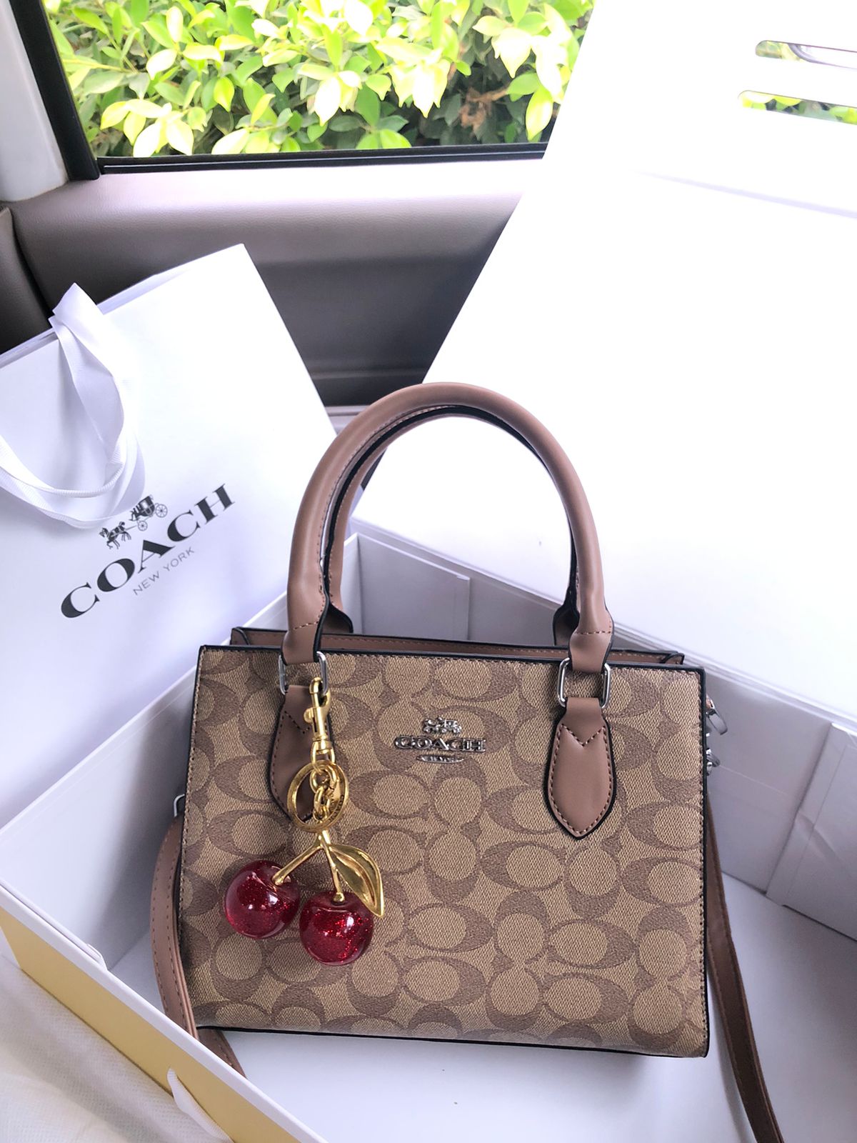 Coach Satchel Handbag with Cherry Keychain Light brown