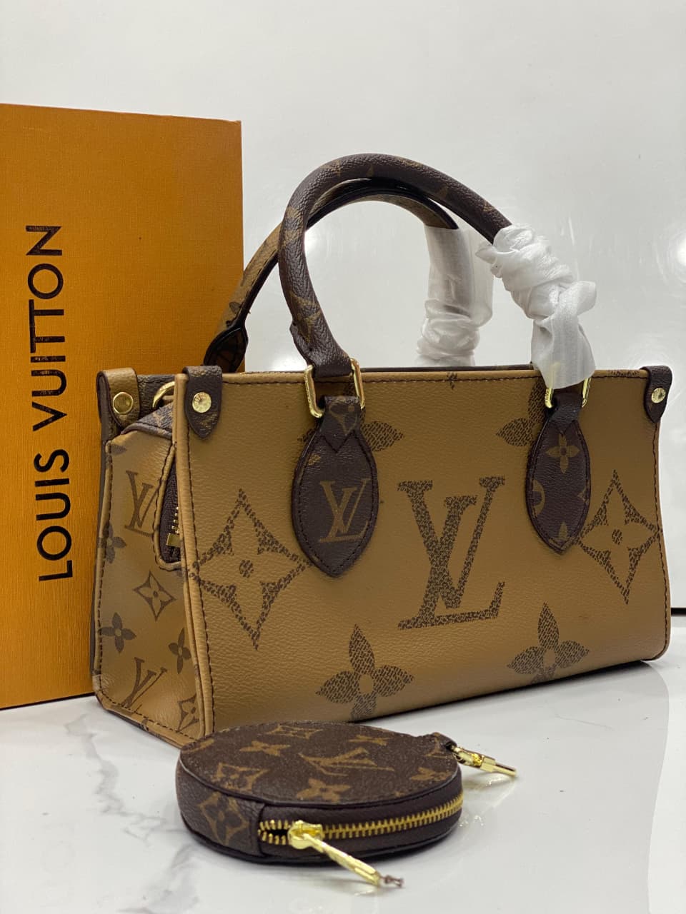 Louis Vuitton LV Onthego East West Monogram Embossed Brown