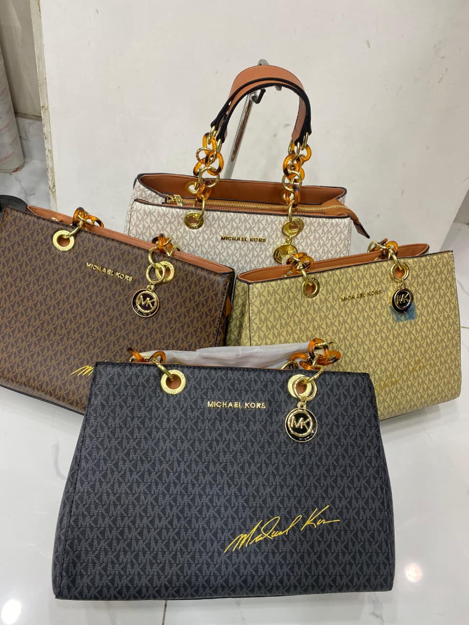 Famous M K Shoulder bag for Women