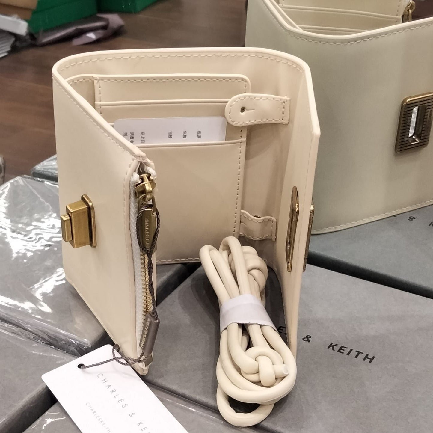 Charles & Keith Edna Turn lock Knotted Strap wallet for Women