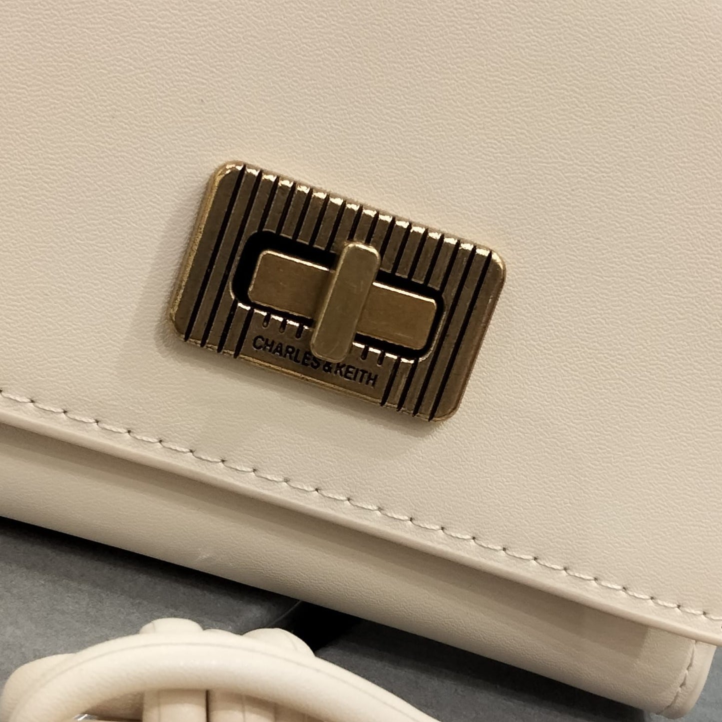 Charles & Keith Edna Turn lock Knotted Strap wallet for Women