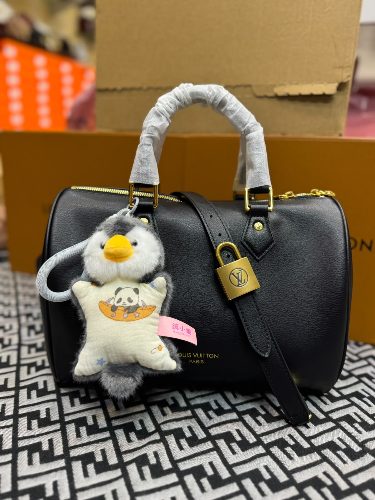 Louis Vuitton Black Leather Handbag with Penguin Charm