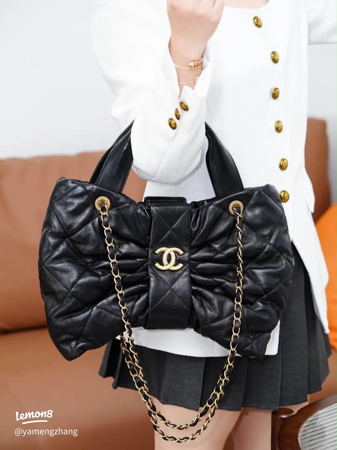 Black Quilted Leather Handbag with Chain Strap