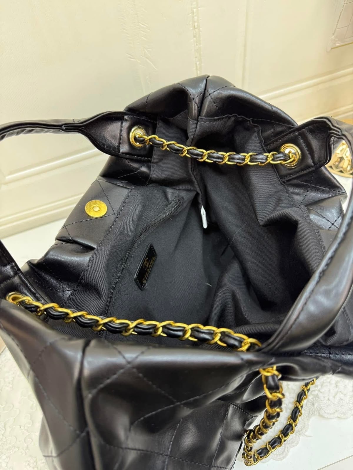 Black Quilted Leather Handbag with Chain Strap